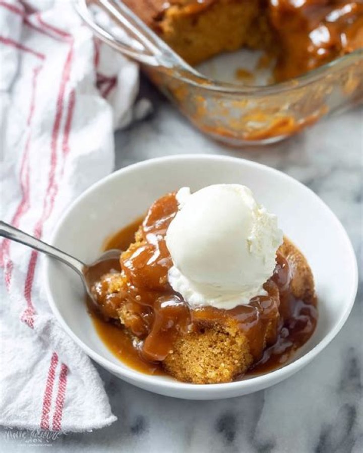 Pumpkin pudding cake with caramel sauce underneath.